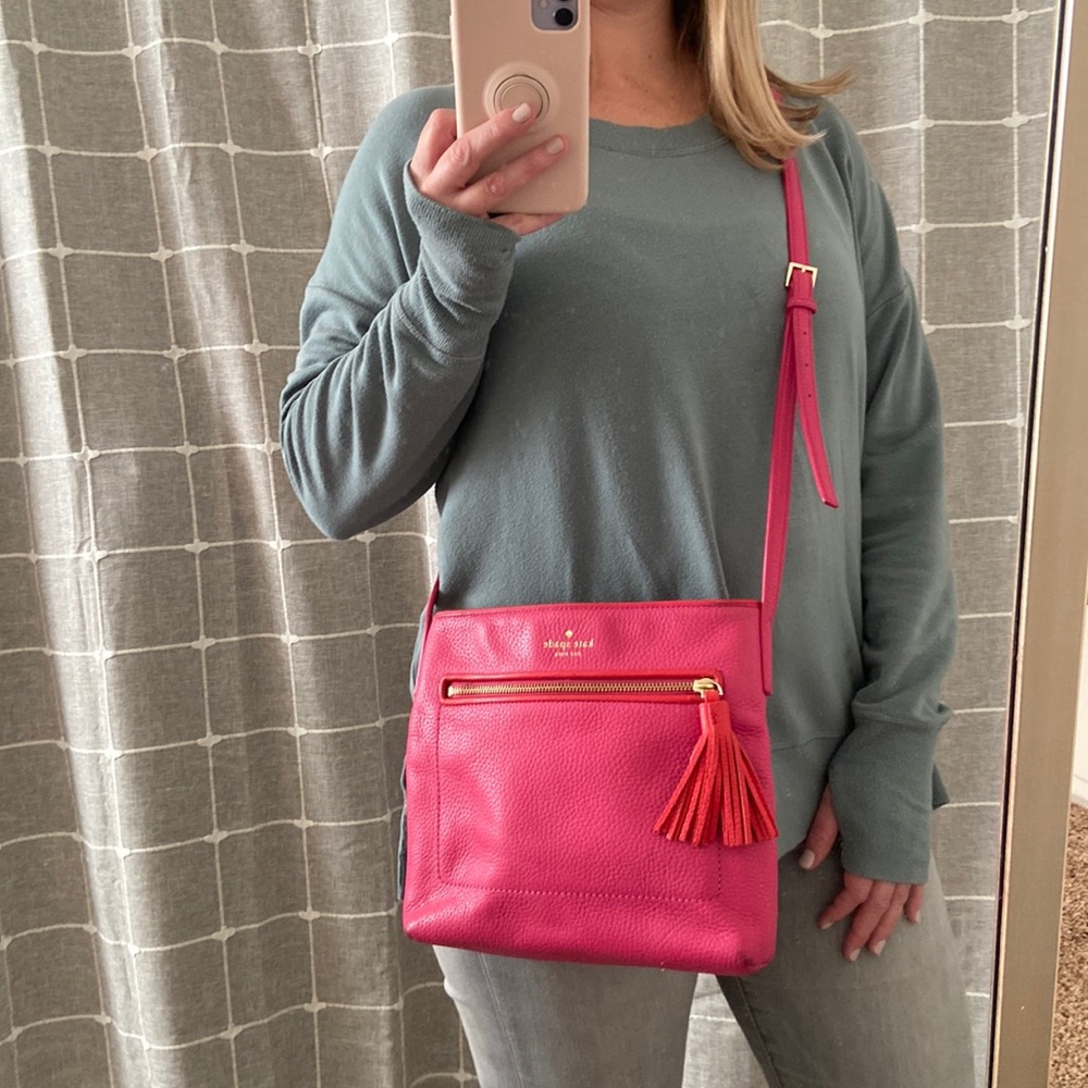 Bright pink Kate Spade crossbody purse
